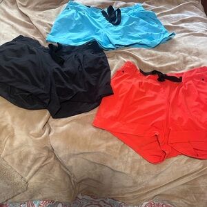 Lululemon Women's Athletic Shorts - Black, Orange and Aqua 10